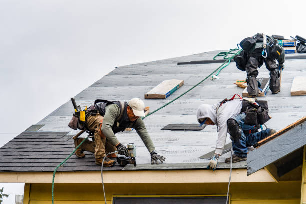 Professional Roofing technician working in Lookeba, OK